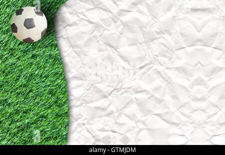 Plastilin Fußball auf Gras- und Papier Hintergrund Stockfoto