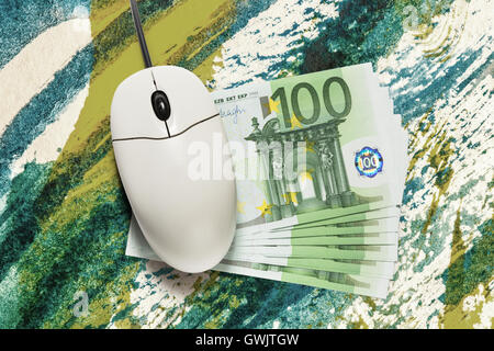 Computer-Maus und hundert Euro-Banknoten Stockfoto