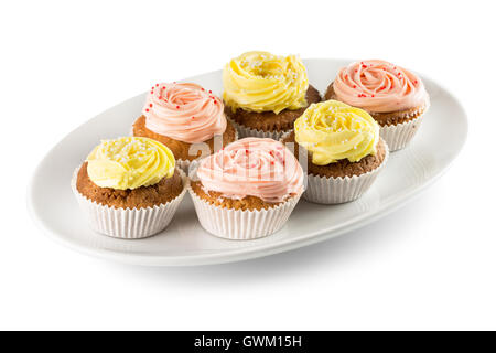 Cupcakes mit Cream auf weißen Teller. Stockfoto