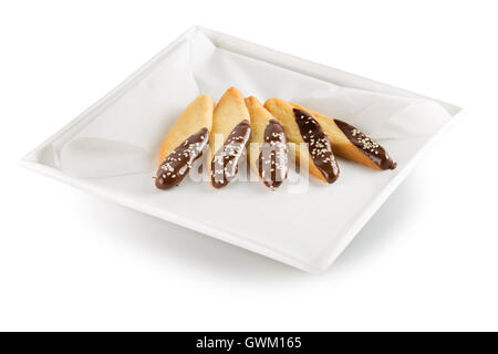 Kekse mit Schokolade Glasur auf weißen Teller. Stockfoto