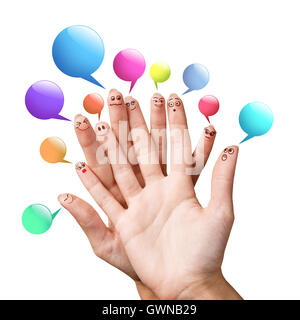 Finger-Smileys mit bunten Sprechblasen Stockfoto