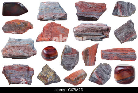 Sammlung von Roh- und Trommelsteine Exemplare von Jaspillite (Jaspilite, eisenhaltige Quarzit) Mineral isoliert auf weißem Hintergrund Stockfoto