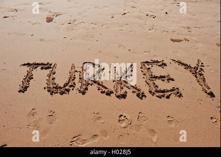 "Türkei" in den Sand am Strand geschrieben Stockfoto