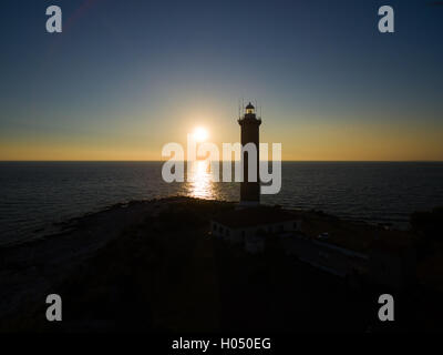 Leuchtturm bei Sonnenuntergang in Veli Rat in Kroatien Stockfoto