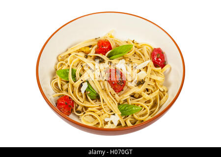 Pasta mit Pesto und gerösteten Tomaten Stockfoto