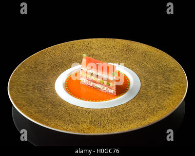 King Crab und Tomate Mille-Feuille mit einem Coulis-verjute Stockfoto