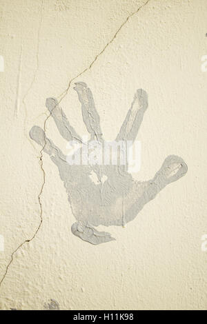 Fußabdruck grauen handgemalt auf Wand, Symbol Stockfoto