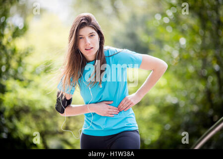 Frau einen Stich leidet. Stockfoto