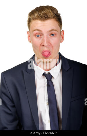Junger Geschäftsmann Anzug zeigt tongu Stockfoto