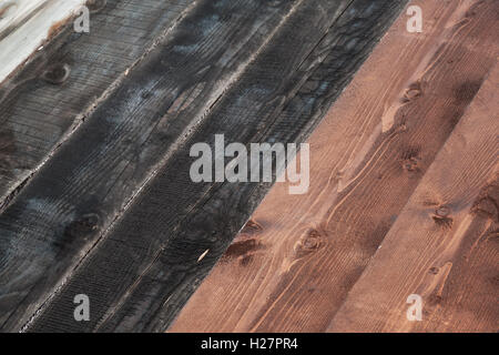 Schwarze und braune Planken. Holzboden Hintergrundtextur Foto Stockfoto