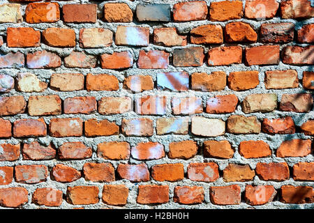 Alten, rauen roten Backsteinmauer Stockfoto
