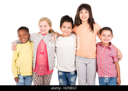 Gruppe von glücklichen Kindern posiert isoliert in weiß Stockfoto