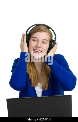 Attraktive blonde Frau, die singt mit Kopfhörer auf Stockfoto