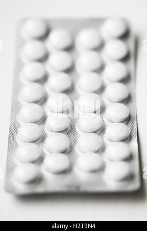 Weiße Runde Pillen Nahaufnahme Makro-Foto Stockfoto