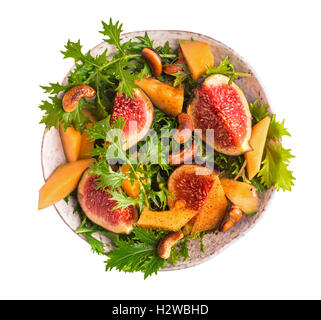 Feigen und Melonen-Salat mit Mizuna isoliert Stockfoto