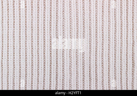 Textur der weiße gestrickte Wollstoff für Tapeten und einem abstrakten Hintergrund Stockfoto