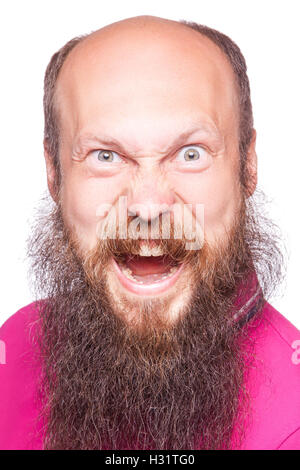 Entfesselt Emotionen. Frustrierte junge Mann mit blauen geöffneten Augen und Mund öffnete stehend Blick in die Kamera, isoliert auf wh Stockfoto