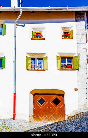 Häuser in Guarda, Symbole, Engadin, Schweiz Stockfoto