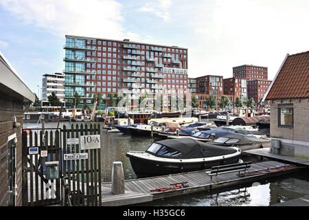 Westerdok Amsterdam Niederlande niederländische moderne Stadt Stadthaus Boot Hausboot Stockfoto