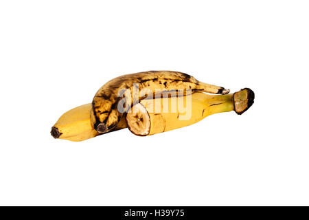 Bananen, die isoliert auf weißem Hintergrund, ganze Banane, eine halbe Banane. Banane auf weißem Hintergrund. СПЕЛЫЕ БАНАНЫ, ИЗОЛИРОВАННЫЕ Stockfoto