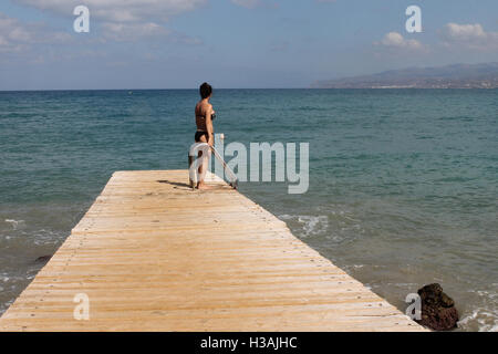 Steg vor der Küste von Stalida-Stalis-Kreta-Griechenland Stockfoto