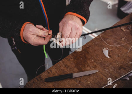 Fischer Köder vorbereiten Stockfoto