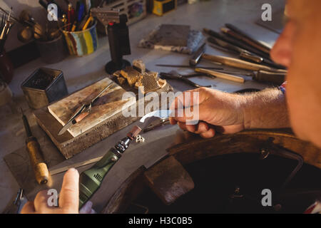 Hand-Stück Automaten Goldschmied Stockfoto