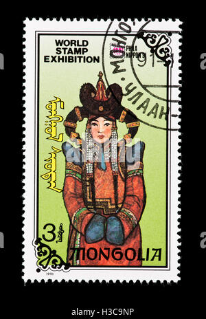 Briefmarke aus der Mongolei zeigt eine mongolische Frau, ausgestellt für Phila Nippon 91. Stockfoto