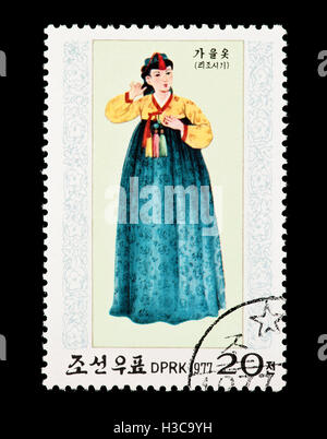 Briefmarke aus Nordkorea Darstellung einen saisonalen Herbst Kleid aus der Li-Dynastie. Stockfoto