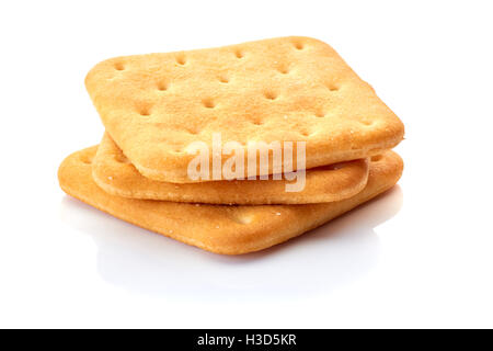 Drei gesalzene Cracker auf weiß Stockfoto