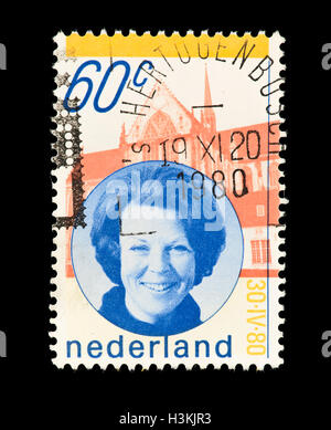 Briefmarke aus den Niederlanden von Königin Beatrix und Palast. Stockfoto