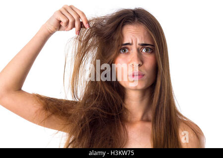 Frau mit Hälfte der Haare gerade und verwirrt Stockfoto