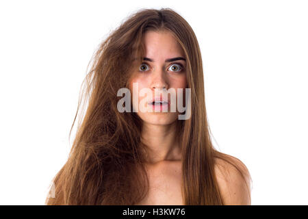 Frau mit Hälfte der Haare gerade und verwirrt Stockfoto