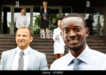 Fröhliche Geschäftsmann Stockfoto