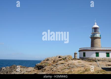 Leuchtturm an der Küste von Corrubedo, Galicien, Spanien Stockfoto