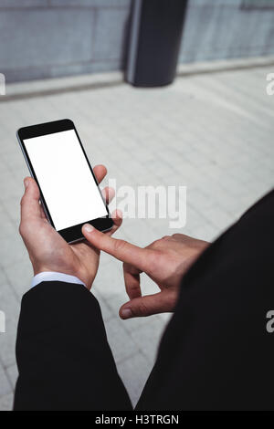 Geschäftsmann mit Handy Stockfoto