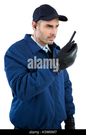 Security-Officer am Walkie-talkie sprechen Stockfoto