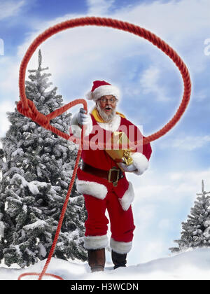 Winter-Holz, Santa Claus, Lasso Studio, Holz, winter, verfassen, Weihnachten, Weihnachtsmann, Santa, Weihnachten präsentieren, fangen, fangen, werfen, fangen, Seil Stockfoto