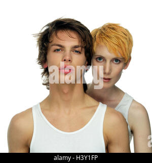 Paar, Porträt, jung, Weste Modell veröffentlicht, ganz in der Nähe, Studio, Freisteller, Jugendliche, Teenager, Teenager paar, Ausdruck, ernst, ernst, Rückfahrkamera, Frau, Haare rot-Blond, tintedly, Mann, dunkelhaarige Stockfoto