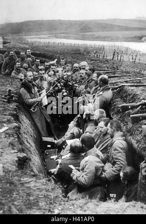 WINTER Waffenstillstand 1914 deutsche Soldaten singen Weihnachtslieder in einem Graben Stockfoto