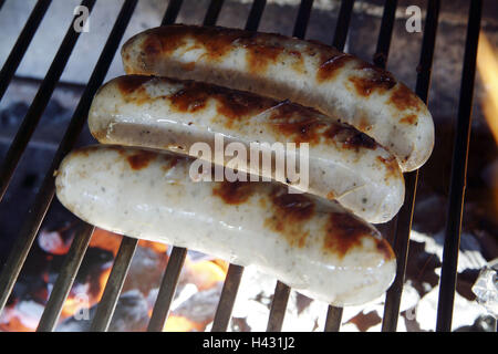 Holzkohle Grill, Gartengrill, Detail, Rost, Würstchen grillen, haben einen Grill, Kohle Grill, Feuer, Kohle, Kohle, Leuchten, Leuchten, Hitze, Hitze, heiß, Würste, Braten, Vorbereitung, Essen, Grill-Würstchen, Stillleben Stockfoto