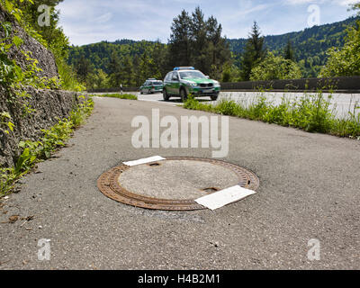 Kanaldeckel versiegelt, geschweißt Stockfoto