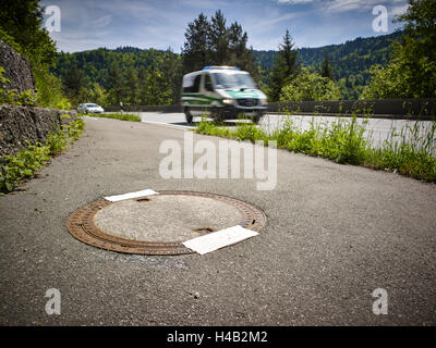 Kanaldeckel versiegelt, geschweißt Stockfoto