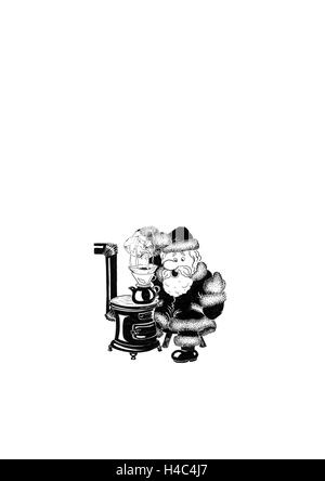 Santa Claus kochenden Tee Stockfoto