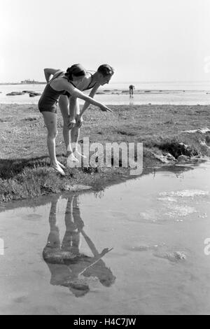 Urlauber Auf der Nordseeinsel Juist, Deutschland 1930er Jahre. Urlauber auf der Ostfriesischen Insel Juist, Deutschland der 1930er Jahre Stockfoto