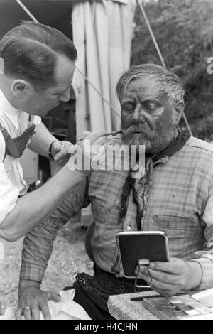 Dreharbeiten Für Den Film "Gold in New Frisco", 1930er Jahre Deutsches Reich. Dreharbeiten für den Film "Gold in New Frisco", Deutschland der 1930er Jahre Programm Stockfoto