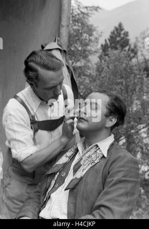 Dreharbeiten Für Den Film "Gold in New Frisco", 1930er Jahre Deutsches Reich. Dreharbeiten für den Film "Gold in New Frisco", Deutschland der 1930er Jahre Programm Stockfoto