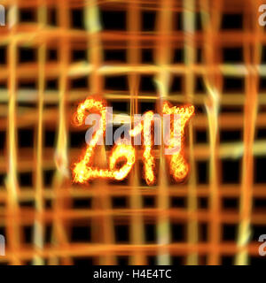 Frohes neues Jahr 2017 isolierte Zahlen mit Feuer auf hell brennende Raster Bokeh Hintergrund geschrieben. Stockfoto