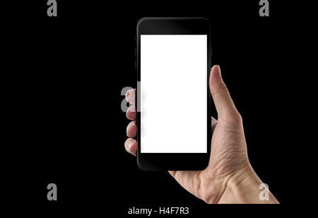 Moderne schwarze Smartphone in der Hand des Menschen. Isolierten weißen Bildschirm für Mock-up. Schwarzer Hintergrund. Stockfoto