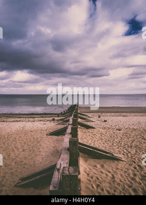 Alte hölzerne Pier auf der Portobello Beach in Edinburgh, Schottland Stockfoto